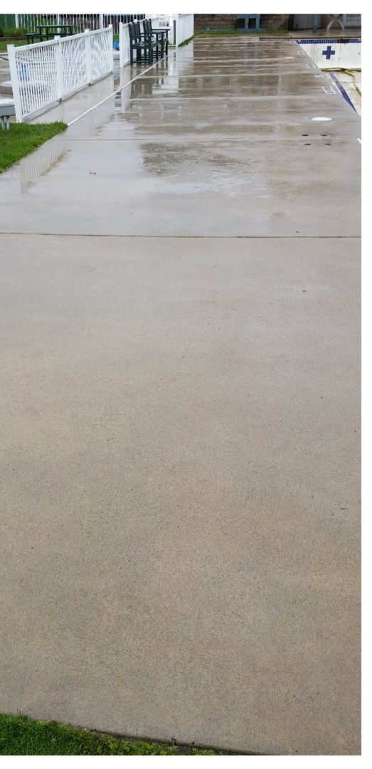 Community pool deck after pressure washing